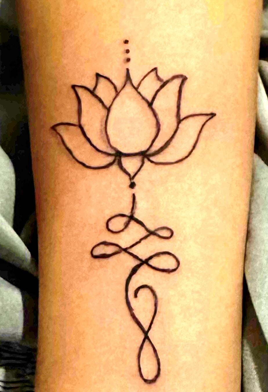 An outlined lotus flower above a looping unalome line
